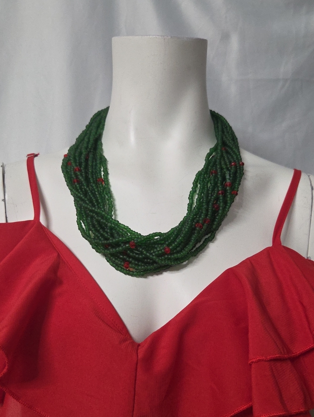 Multi-Strand Green Beaded Necklace with Red Accents